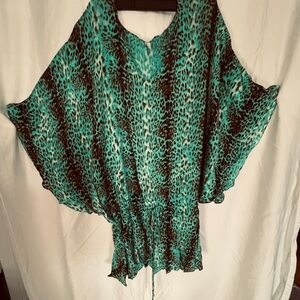 Turquoise Leopard Print swimsuit cover up.